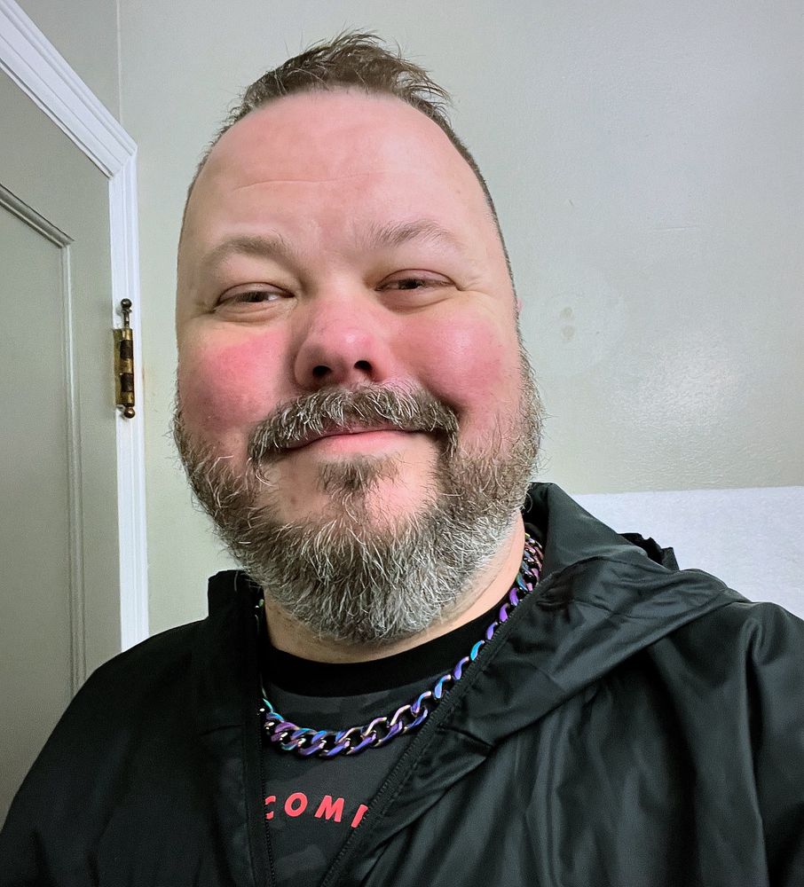 Man in rainbow chain