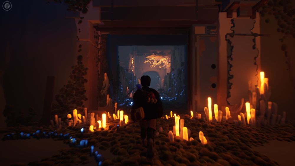Notre personnage marche dans unE sorte de grotte très joliment illuminée de jaune et bleu.