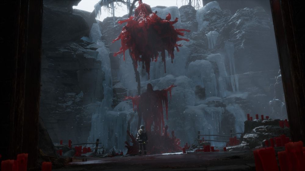Une image du DLC de Lies of P. P se tient devant une sculpture de sang faite de corps des victimes de « l’artiste ».