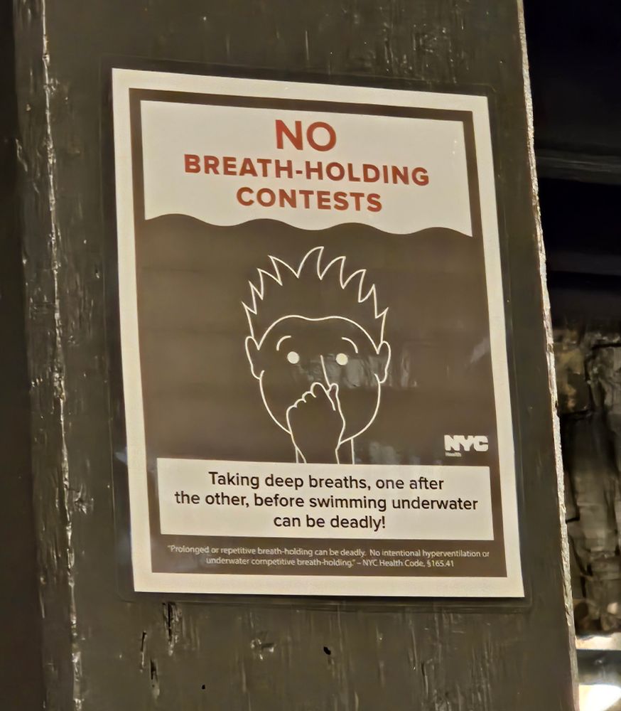 No breath-holding contests sign