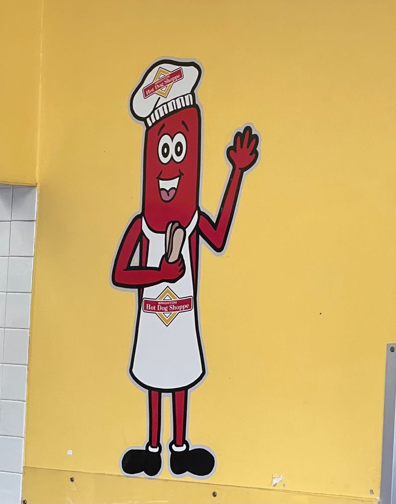 Anthropomorphic Hot Dog holding a hot dog at the Western Pennsylvania chain restaurant The Brighton Hot Dog Shoppe. 