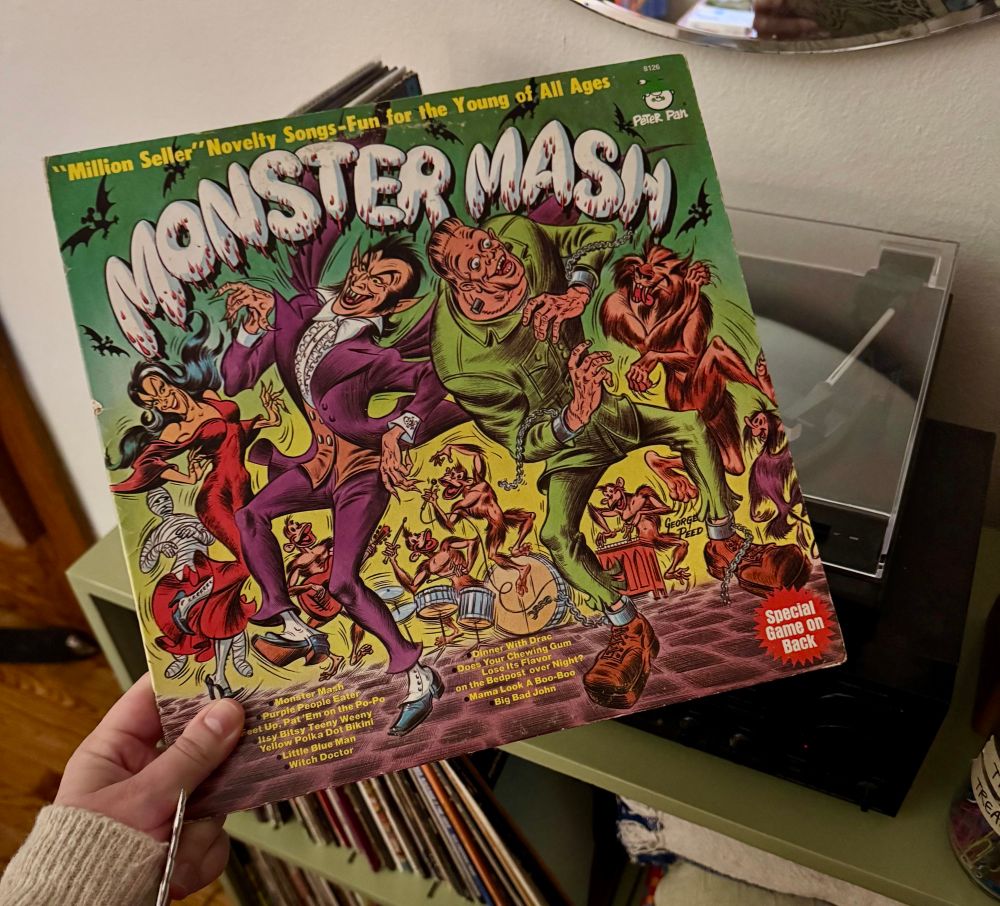A vinyl of The Monster Mash. A gaggle of goblins and ghouls are getting down