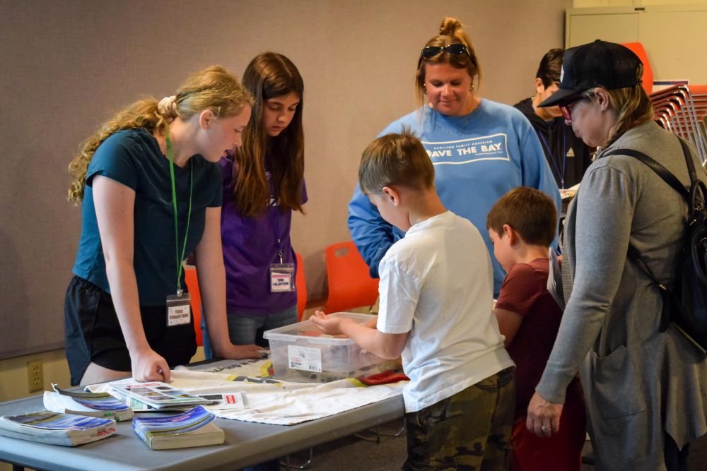 Teen Volunteers and Save the Bay Staff share information about the creatures living in Narragansett Bay