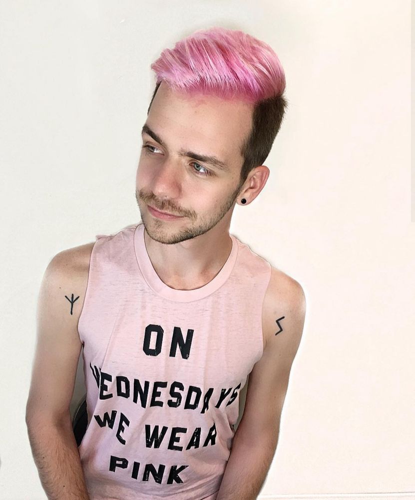 An old photo of me, shirt reads: “On Wednesdays We Wear Pink”