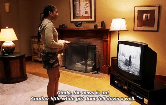 Screencap, Scary Movie 3. Text: “Cindy the news is on! Another little white girl done fell down a well.”