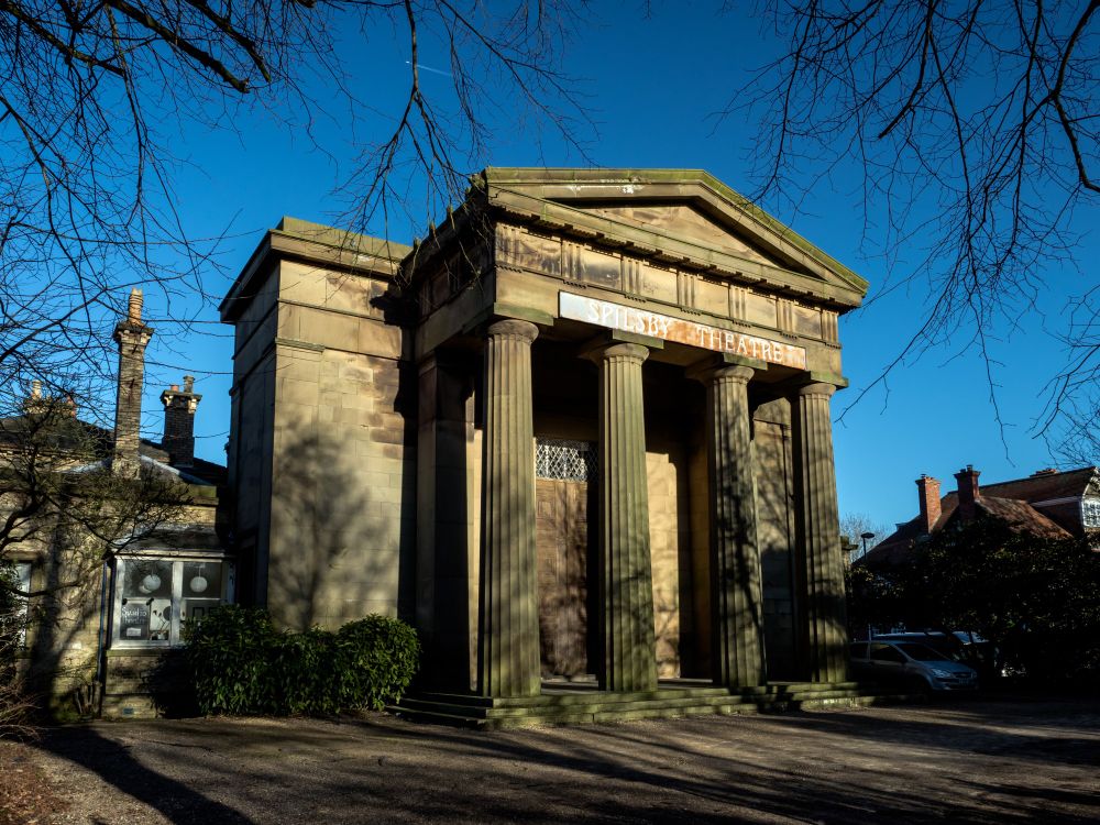 Exterior of Spilsby Sessions House, a former gaol with a classical facade with columns.
