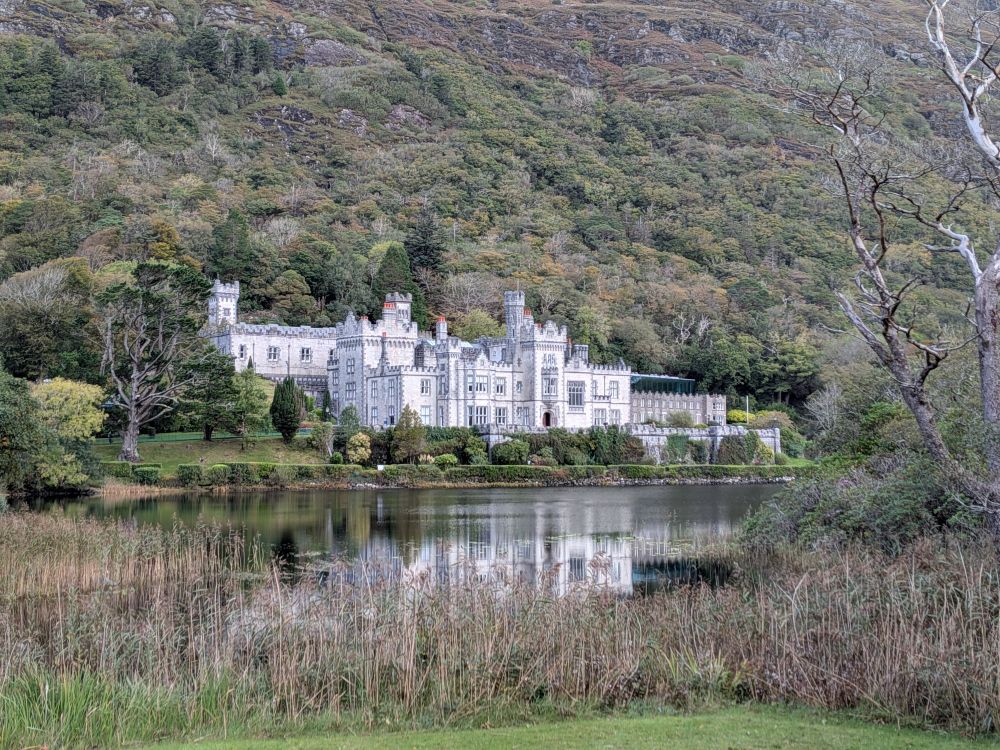 White, castle-like Abbey on the water