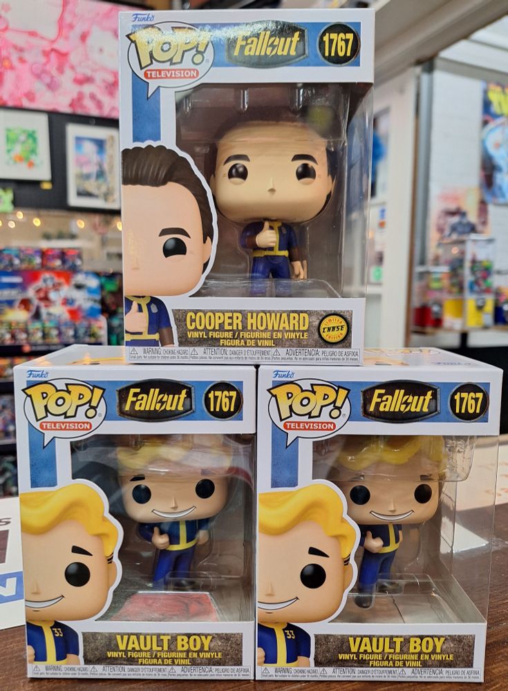 3 Funko Pop of Vault Boy Funko Pop stacked in a pyramid. The top is the Chase Limited Cooper Howard Variant. The bottom two are Commons.