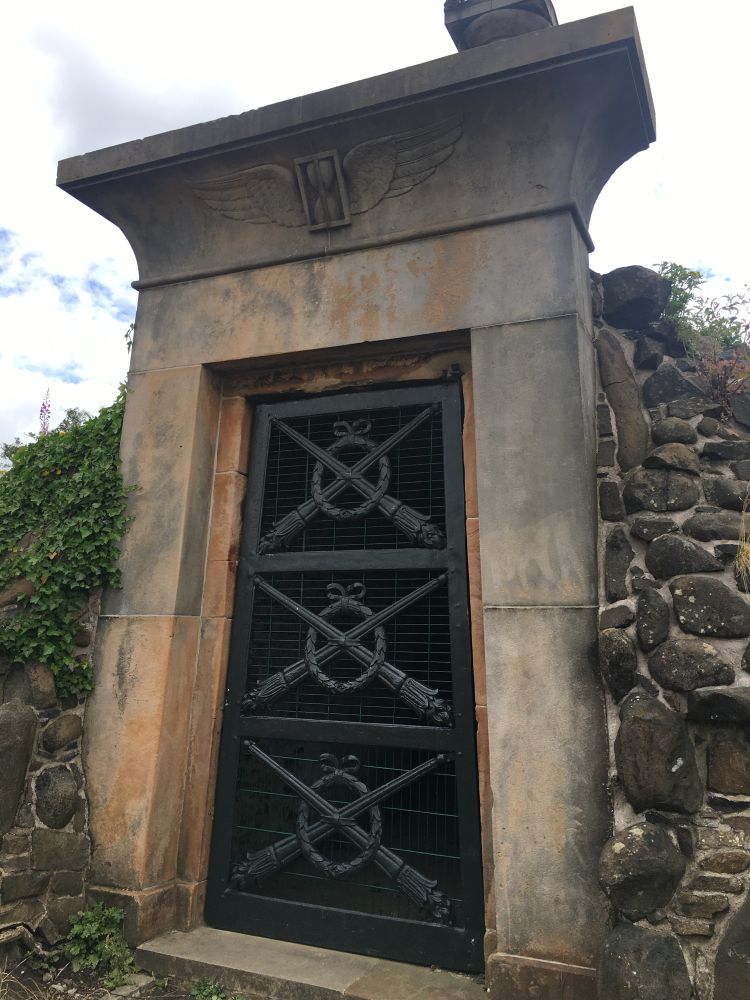 The Egyptian Vaults of 1837, Glasgow Necropolis. The structure was used for the temporary storage of bodies while tombs were being prepared, or mausolea built. I love the extinguished torch motif on the restored iron gate.