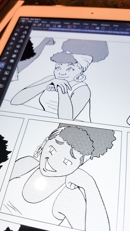 A photo of an ipad with clip studio paint open. There is a partially shaded comic page featuring a young Black teen talking.