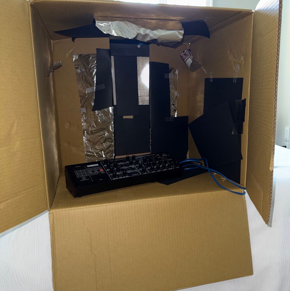 Cardboard box with tin foil and a Behringer synth to simulate inside of Nemo