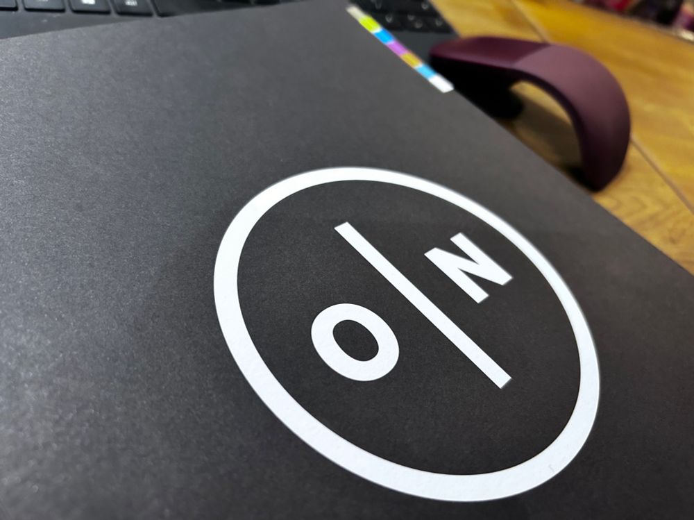 A copy of On Gaming Magazine on a table 