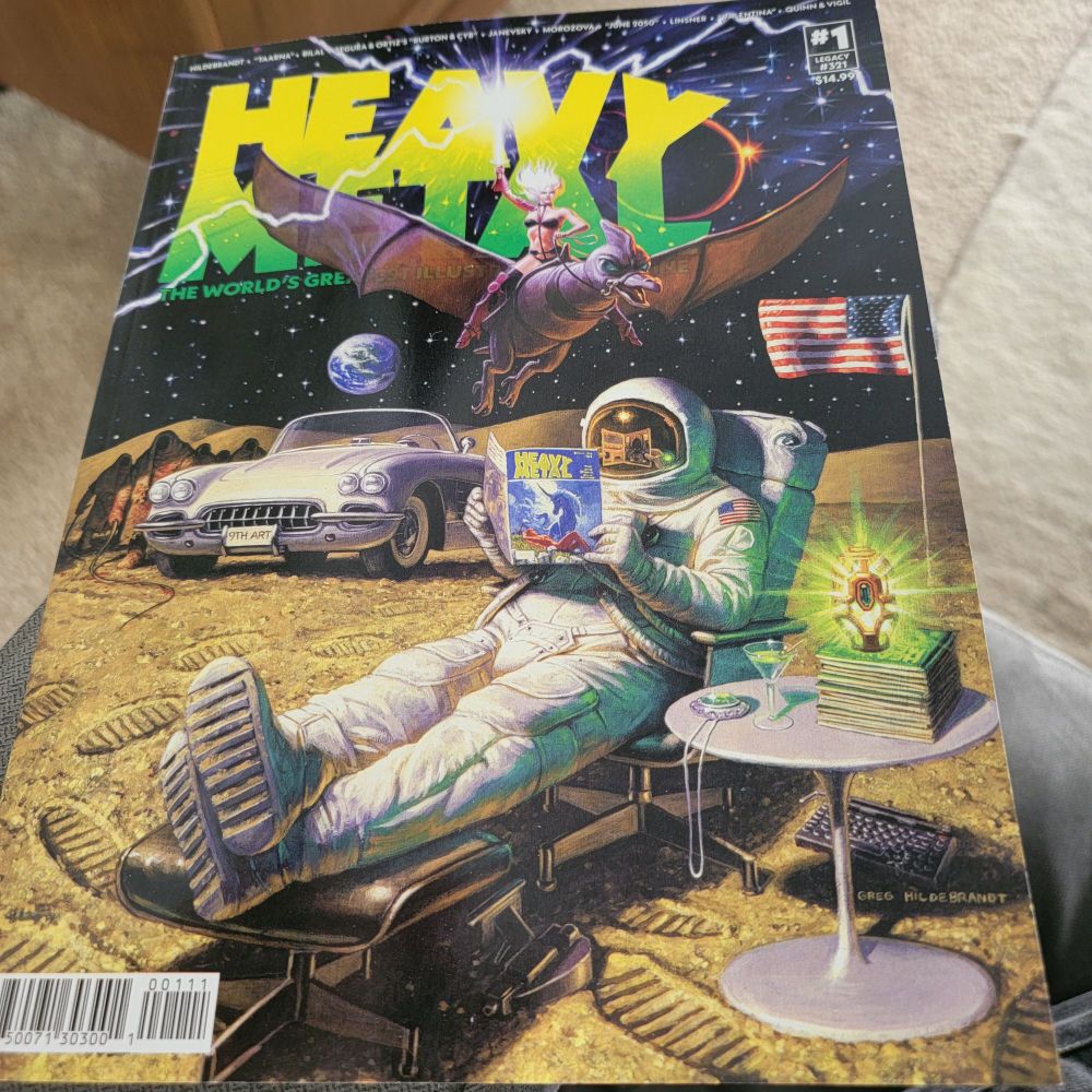 The cover of Heavy Metal Magazine #1 (Legacy #321), released May 2025. It shows an astronaut reading a copy of the magazine, sitting next to a classic car, with a warrior woman riding a winged creature above the astronauts head. 