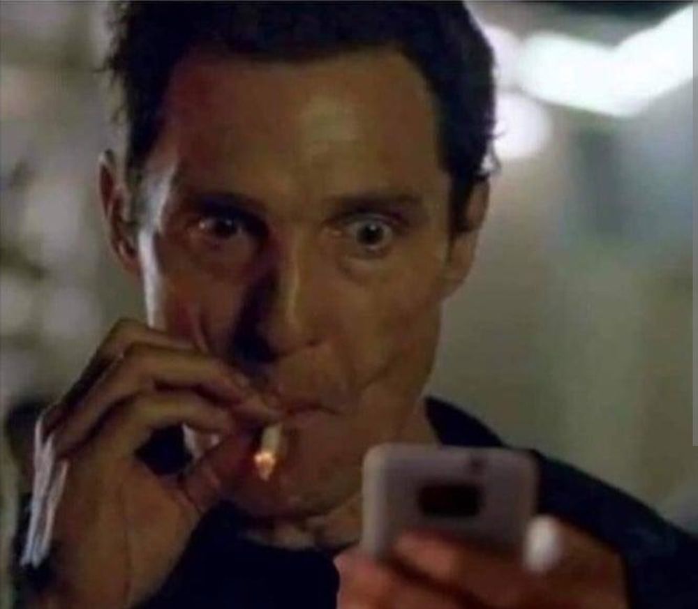 Mathew McConaughey being a fiend, intensely sucking on a cigarette staring at a phone. Definitely not what we look like while binging Nintendo Switch 2 videos. 