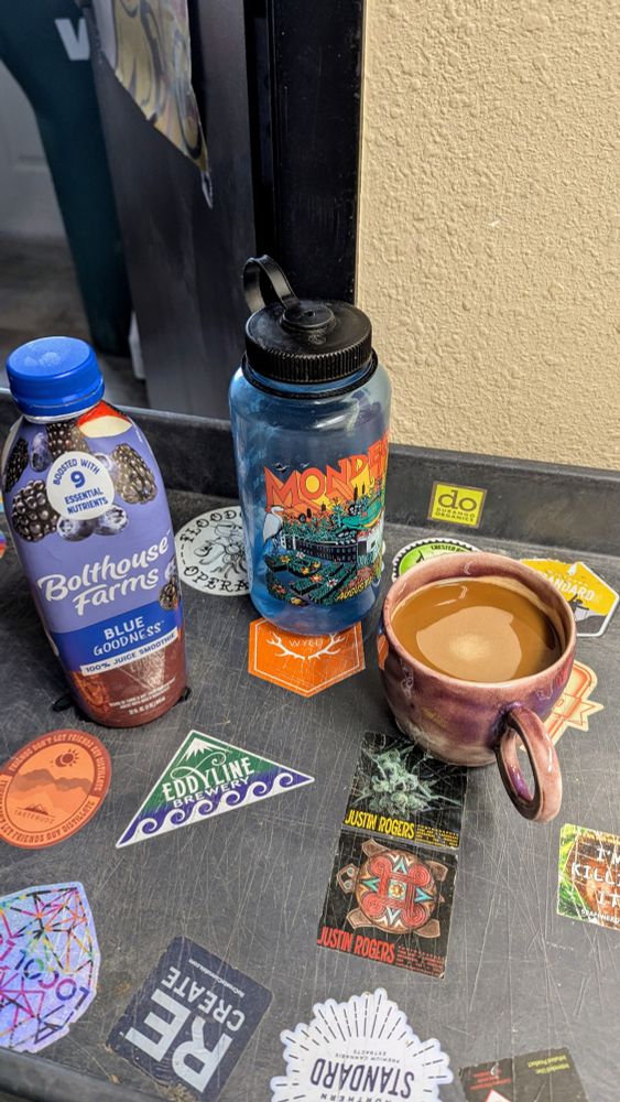 Berry smoothie, water, and coffee. The standard morning at the shop. Ft. Mondegreen bottle