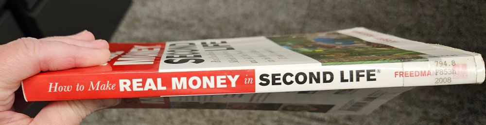 Spine of book titled to make real money in Second Life.