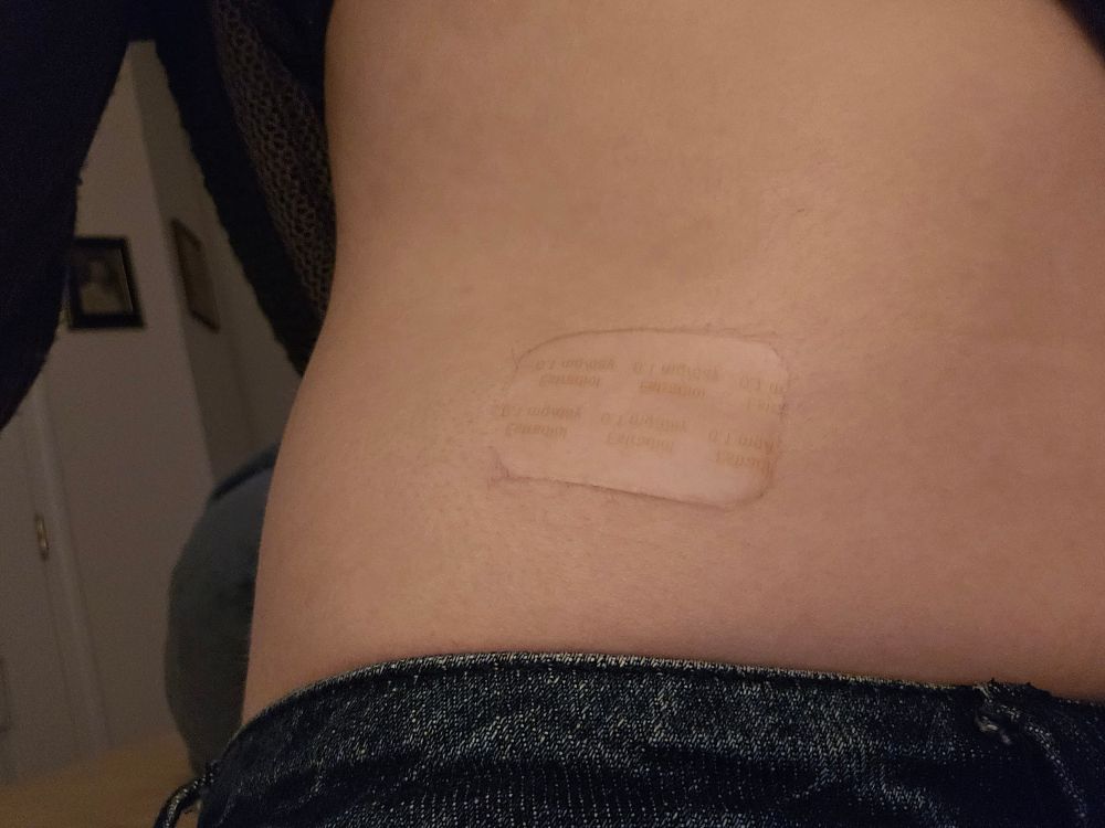 Estrogen patch on my sexy sexy tummy 