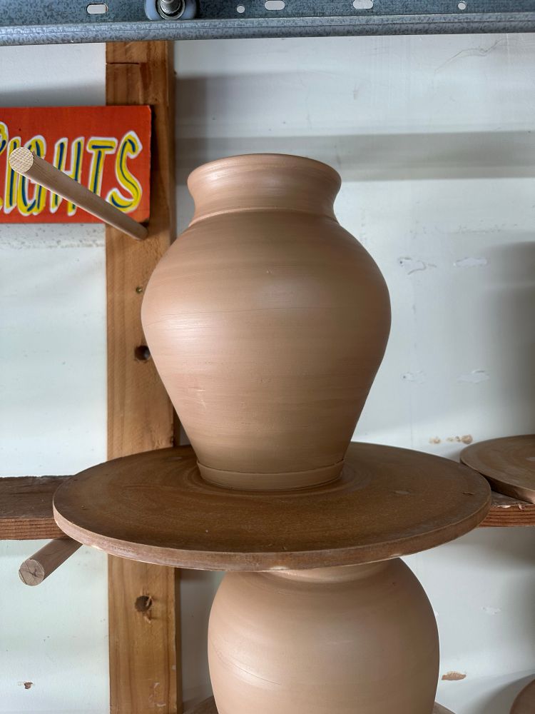 a stoneware vessel fresh off the potters wheel. 