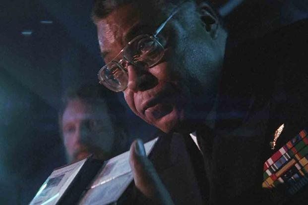 James Earl Jones as Admiral Greer from The Hunt for Red October. Another dude in the background, but let's ignore him.