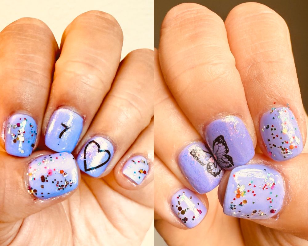 Awkward photos of my hands with the nails painted light purple. The middle and ring fingers have a 7 and a heart on one hand and two halves of a butterfly on the other. All other nails have multicolored sparkles. 