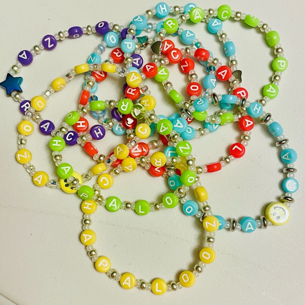 Colorful beaded “Rachapalooza” bracelets for Stray Kids. 