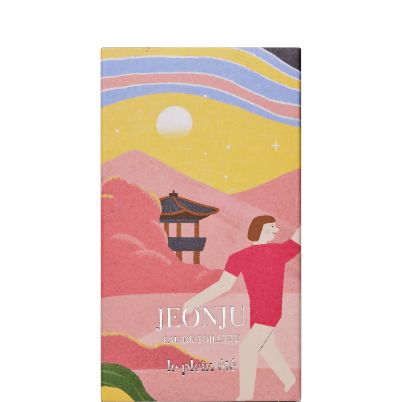 The box/art for Pink Wonder. Blue and yellow waves make up the sky behind pink mountains and clouds, a temple, and a person in a hot pink garment. 