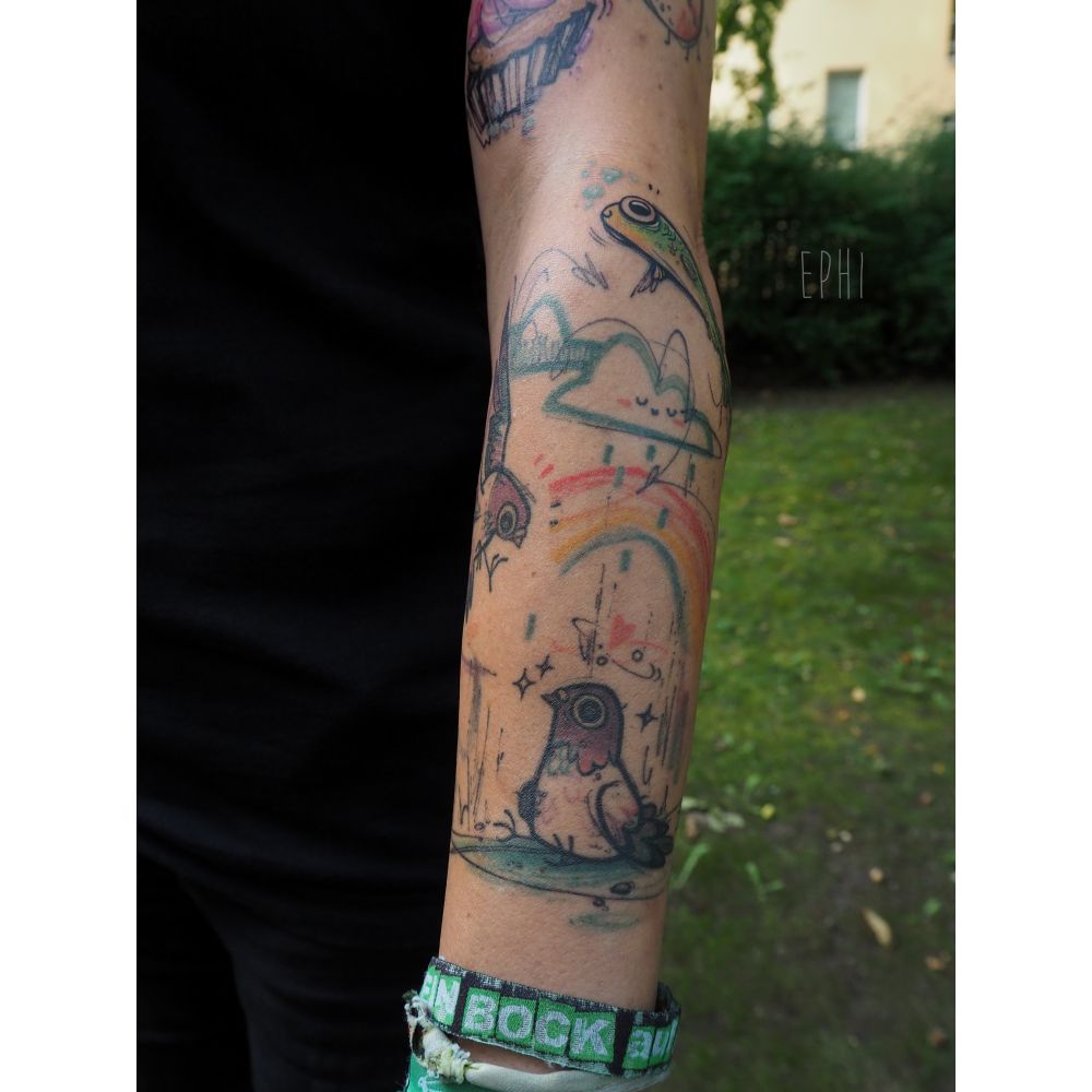 Closer shot of the outside of the lower arm, showing the pigeon scene and fish.