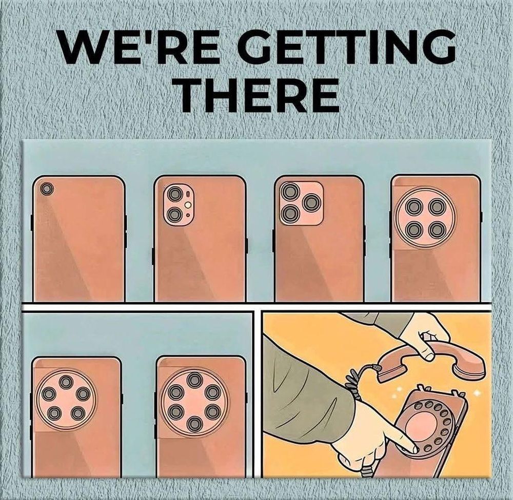 A meme of several panels
The top panel contains cartoonish drawings of phones with progressively increasing numbers of camera lenses. First 1 lens, then 2, then 3, then 4, 5 and 6 becoming more and more a circle of lens "holes".
Finally, an image of a phone with a full circle of lens "holes" resembling a rotary "dial" based telephone, and hands lifting a receiver and dialling.
The text across the top reads: "WE'RE GETTING THERE"