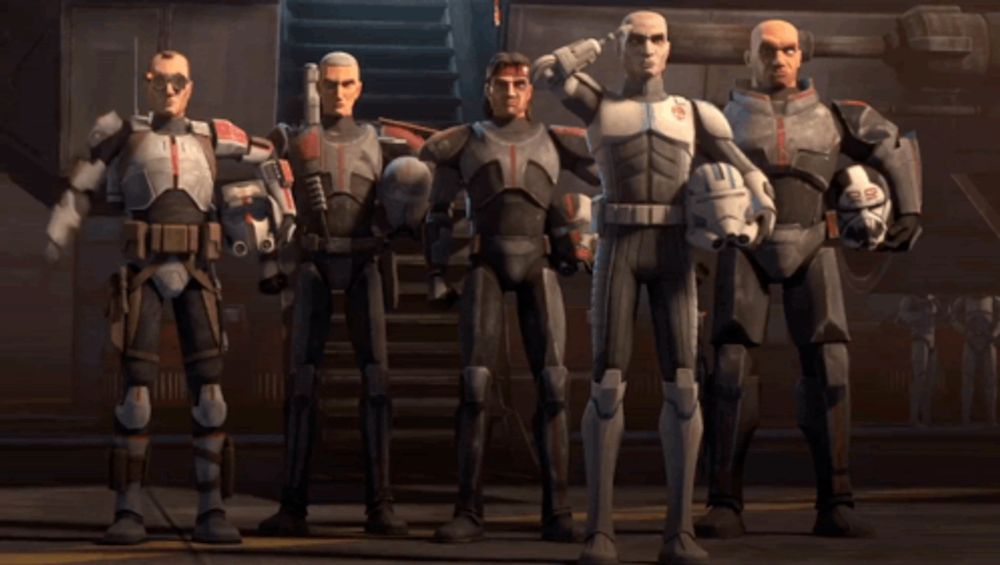 a group of clone troopers stand in a line