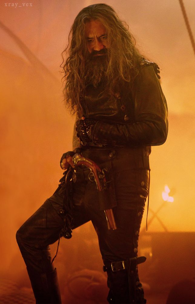 Edward Teach making his dramatic entrance in Our Flag Means Death, s1 ep 3. he's just introduced himself to Stede Bonnet, his soulmate and love of his life.