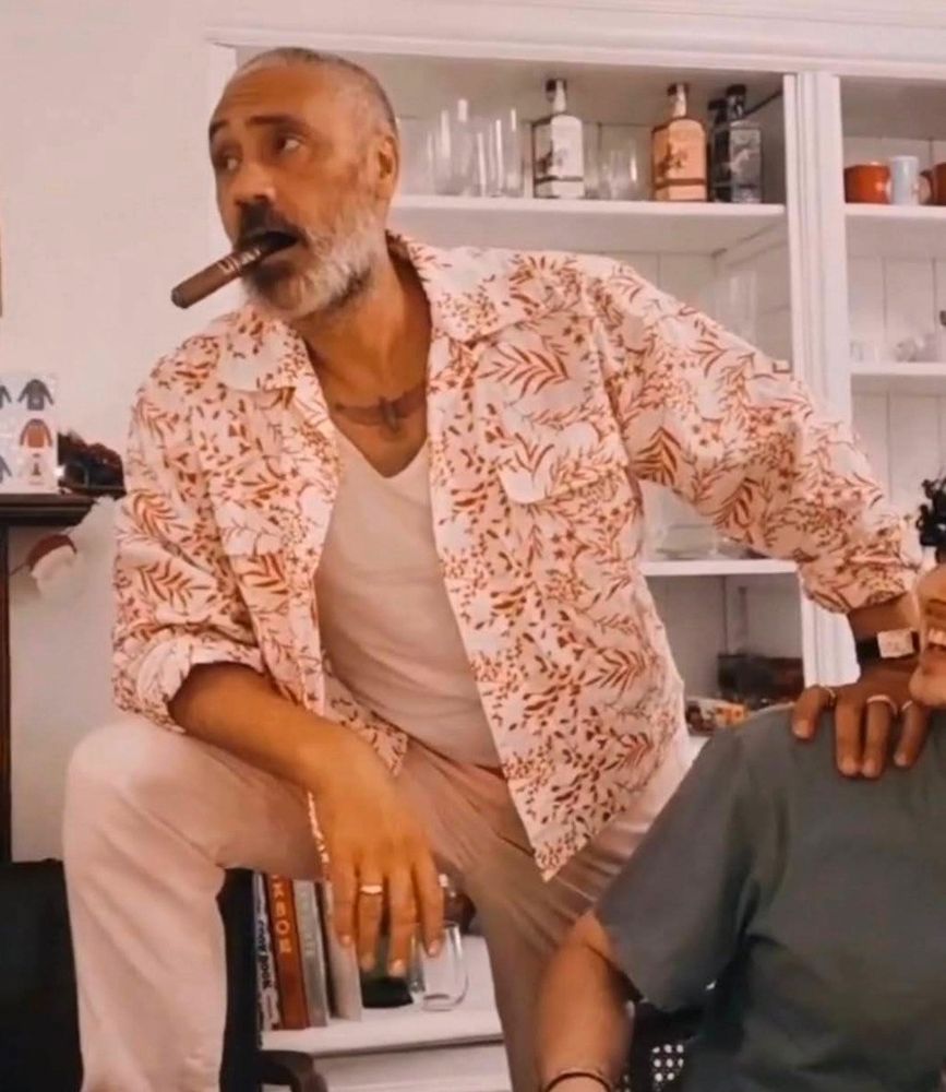 taika waititi w/ a cigar in his mouth