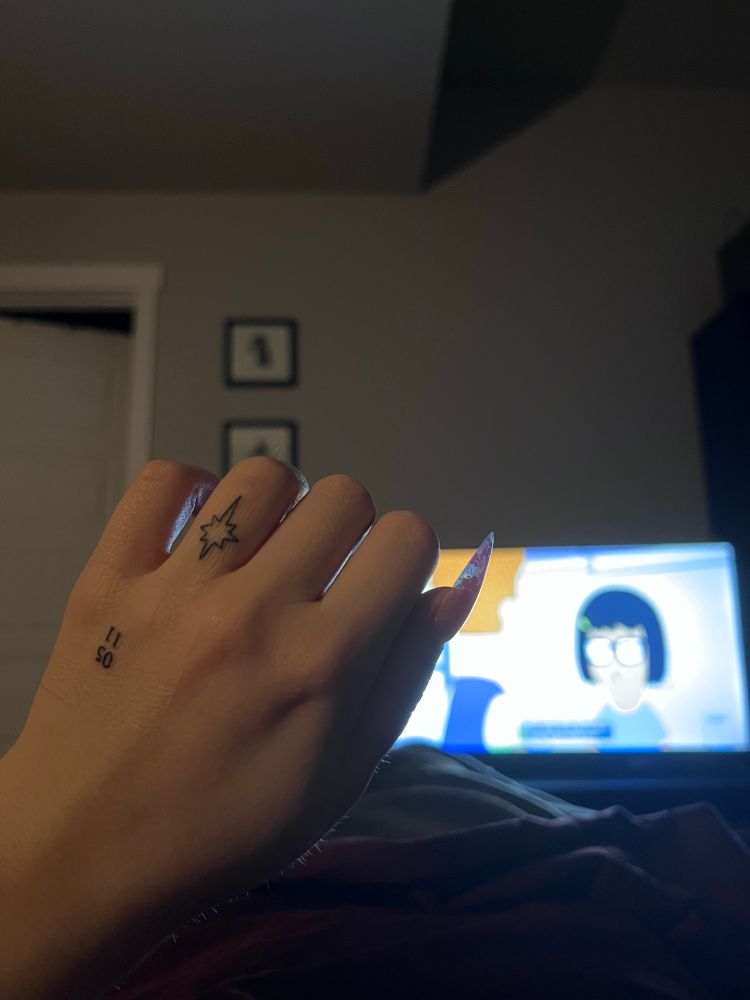Finger tattoo