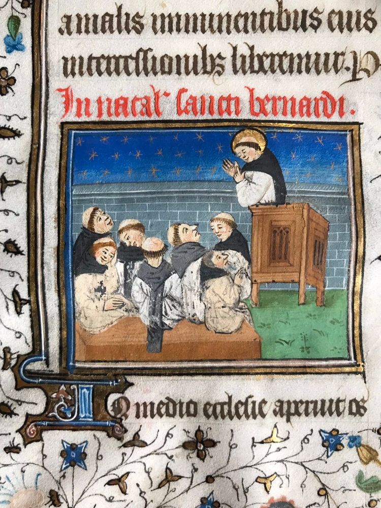 Illumination of St. Bernard preaching to a group of seated Cistercian monks from a mid-15th century Missal, possibly produced for and used at Neubourg Abbey in Alsace. Text: prompts, chants, and readings for feasts of the Assumption of the Virgin and the nativity of Bernard of Clairvaux. Shelfmark: Rare Books & Manuscripts Library, The Ohio State University, Spec.Rare.MS.MR.Frag.449.