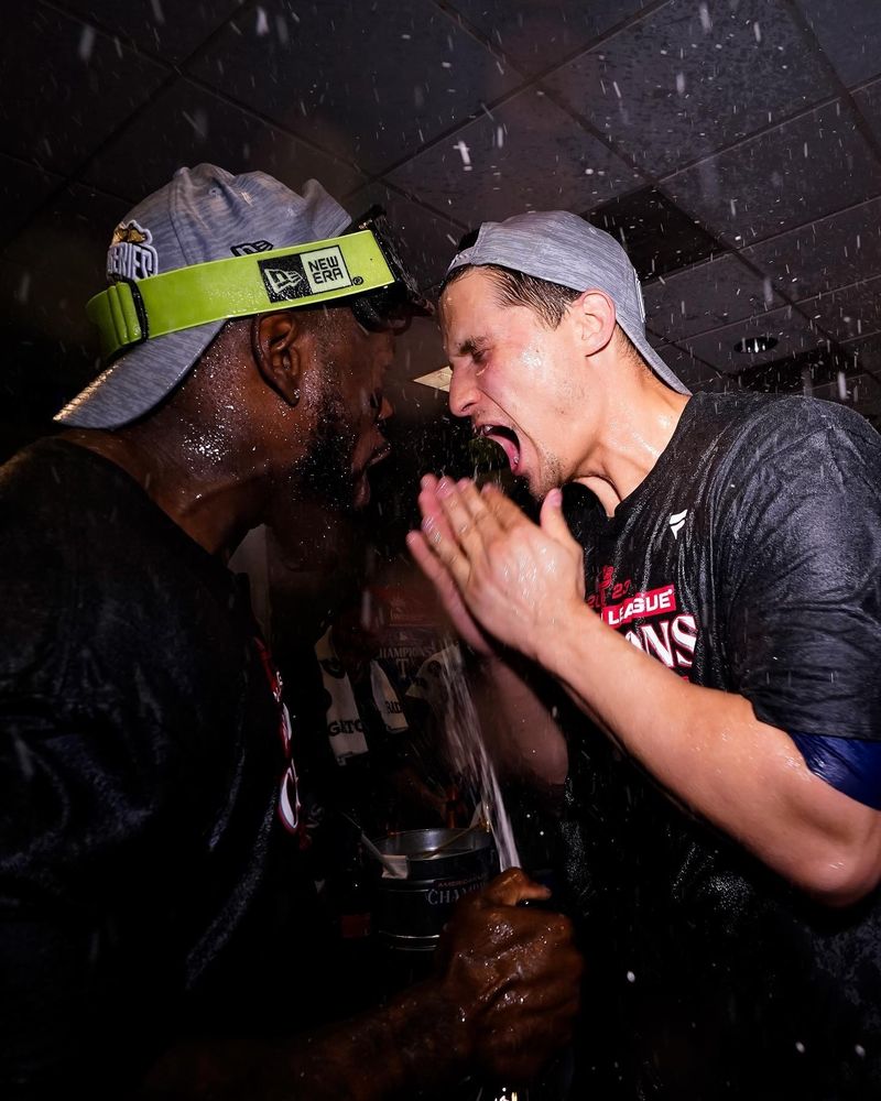 Adolis and Corey joyously yelling in each other's faces during what I think is the alcs champagne celebration