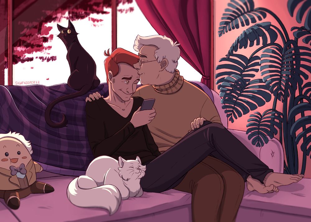 Aziraphale and Crowley sitting on a couch with a white and black cat. Aziraphale is smooching Crowley's forehead while Crowley plays on his phone and smiles. The white cat is fluffy and loafing next to Crowley. The black cat is sleek and looking alert from the top of the couch. 