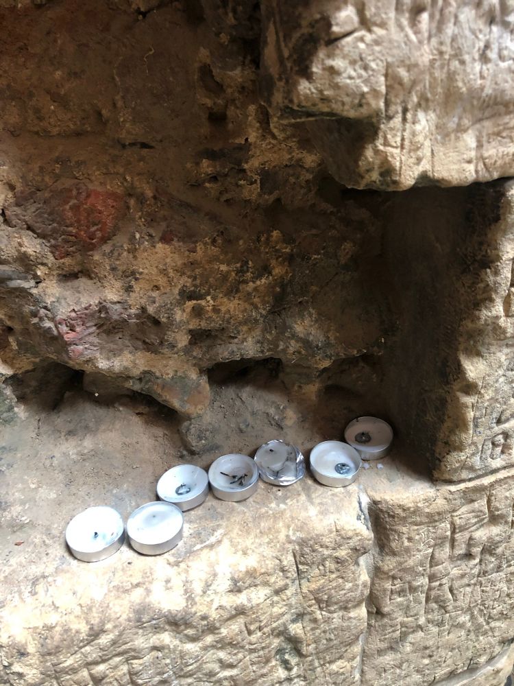 Tea lights inside the brick milltower