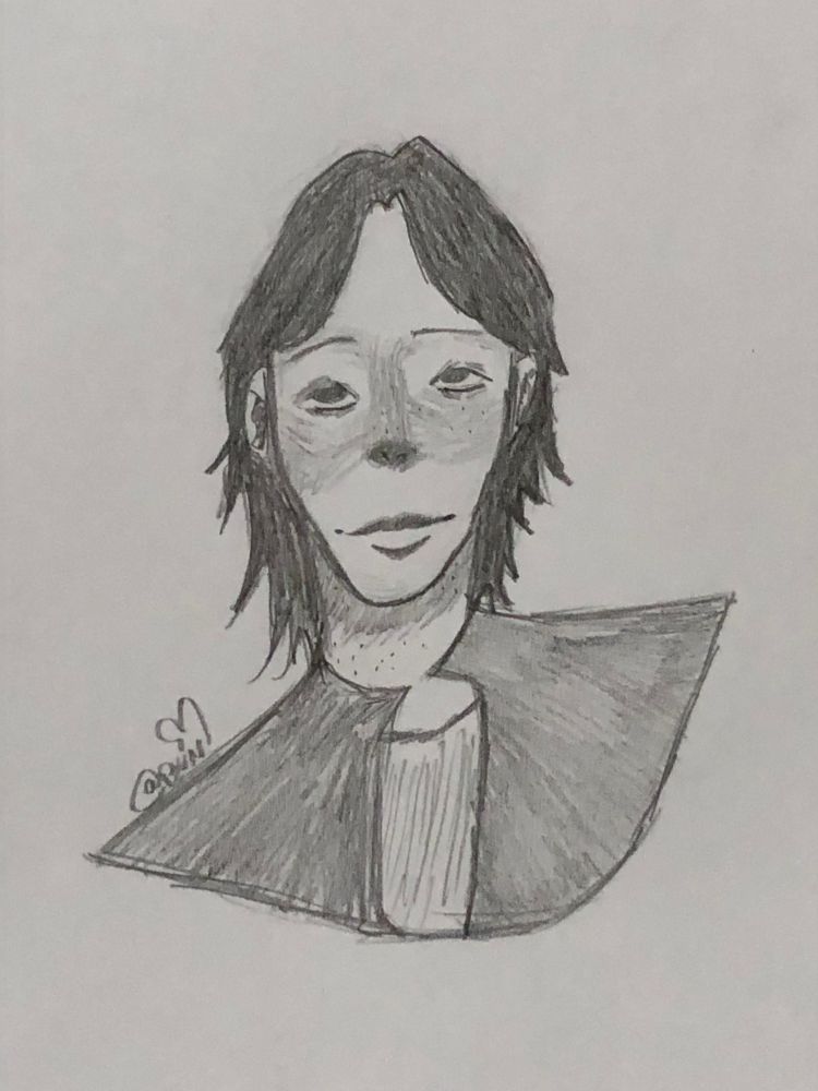 uma arte de um Oc, desenho feito todo a lápis.
Na arte a pessoa tem cabelos curtos (na altura do pescoço), com uma jaqueta aberta, tem sardas pelo pescoço e algumas do lado direito do rosto, tem uma expressão neutra, e tem um estilo diferente de "pintura" na parte da bochecha e nariz.