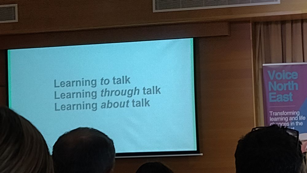 Photo of Rob's slide. It says 'Learning to talk, learning through talk and learning about talk.'