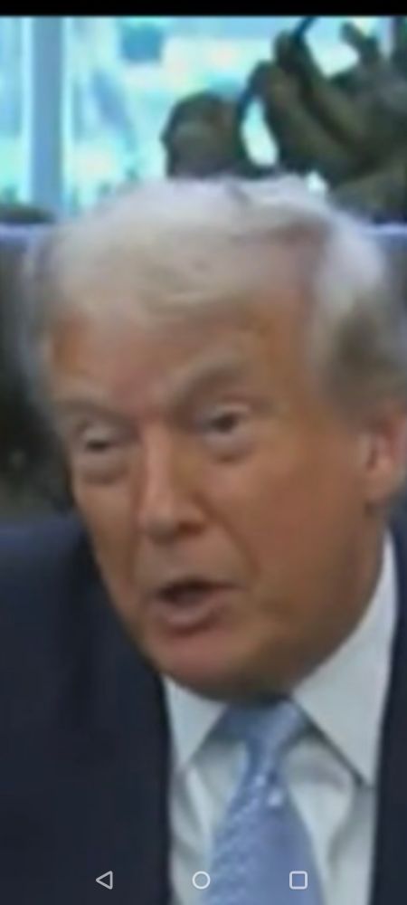 Photo of President Donald J Trump looking as though he has just awakened from a long winter's nap.