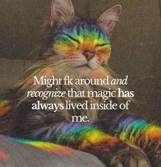 A cat with its eyes closed with rainbow-colored fur due to light effects. Overlaid text reads "Might fk around and recognize that magic has always lived inside of me." The cat appears peaceful and content, creating a whimsical, magical mood.