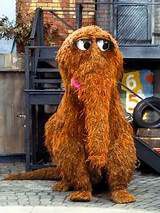 Mr. Snuffleupagus standing on Sesame Street