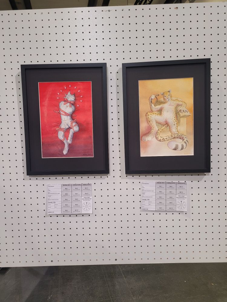 A panel with two erotica pieces of art