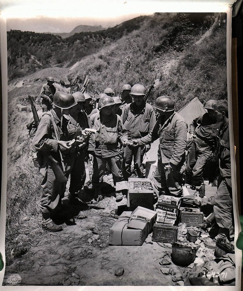 Soldiers purchasing Zagnut candy bars in 1945. Public domain photo from the Zagnut Wikipedia entry. 