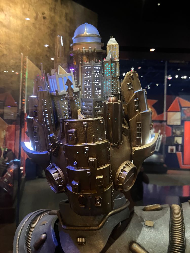 The back of Janelle Monae’s Archandroid crown featuring a tiny cityscape