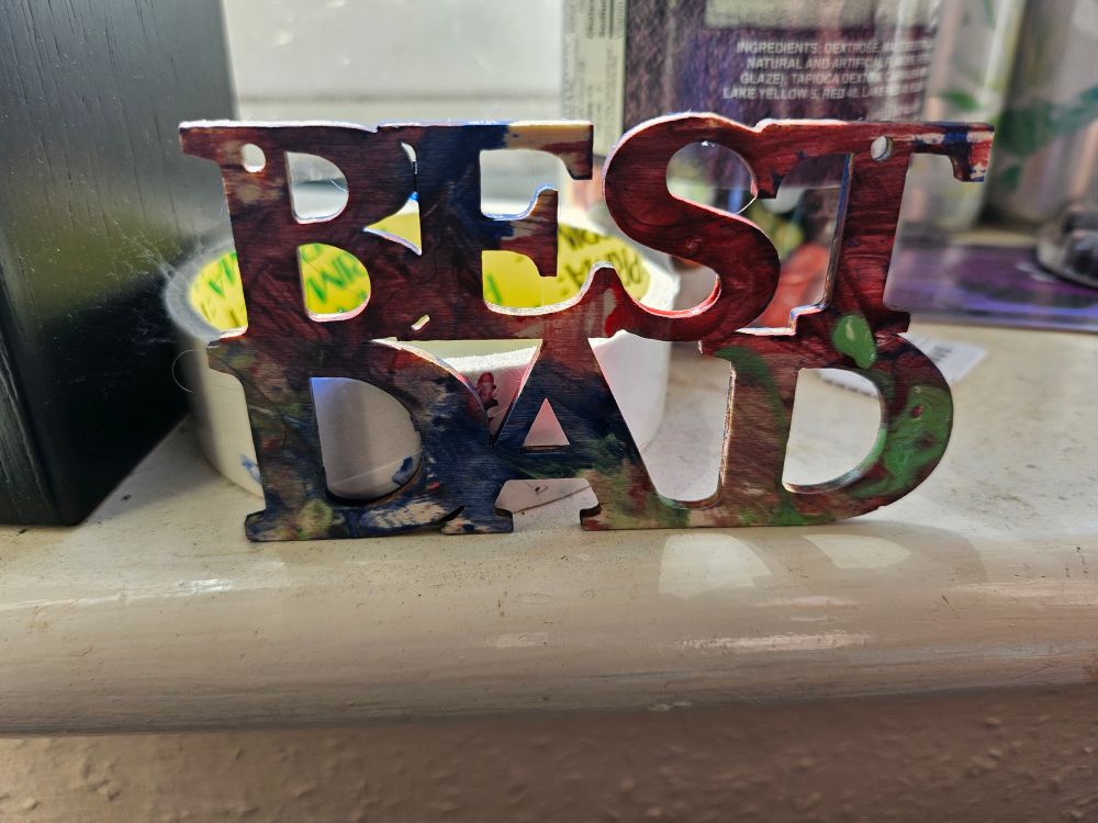 A best dad sign my son painted before I had woke up 🥺