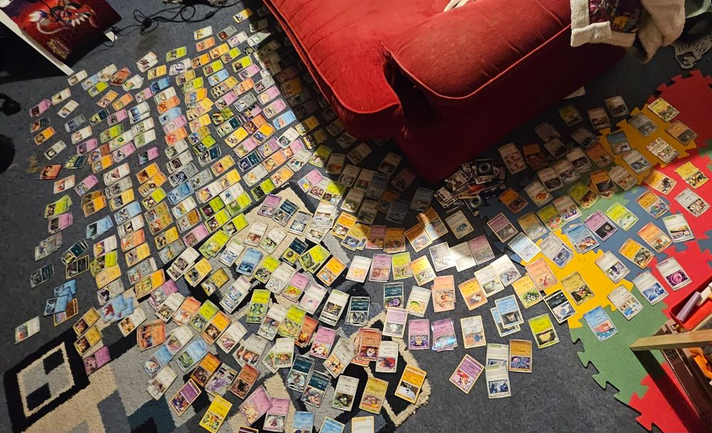 Sorting out a quarter bag of pokemon cards 