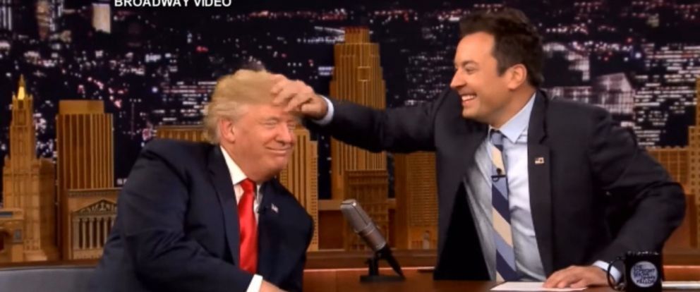 Jimmy Fallon rubs Donald Trump head
