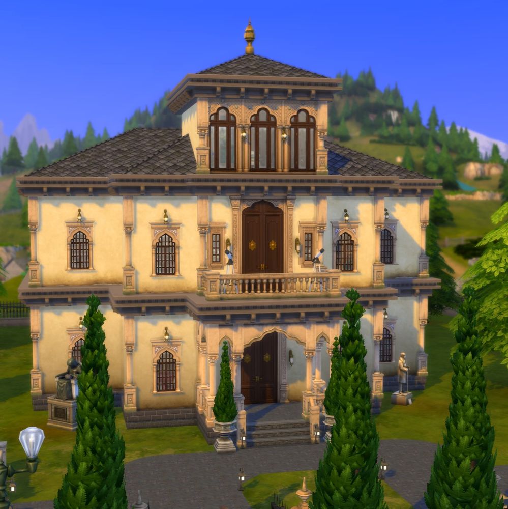 Screenshot of a Romanian Revival mansion created in the Sims 4.  The mansion is massive and made of cream-colored stone with a dark tile roof and elaborate decorative windows and doors.