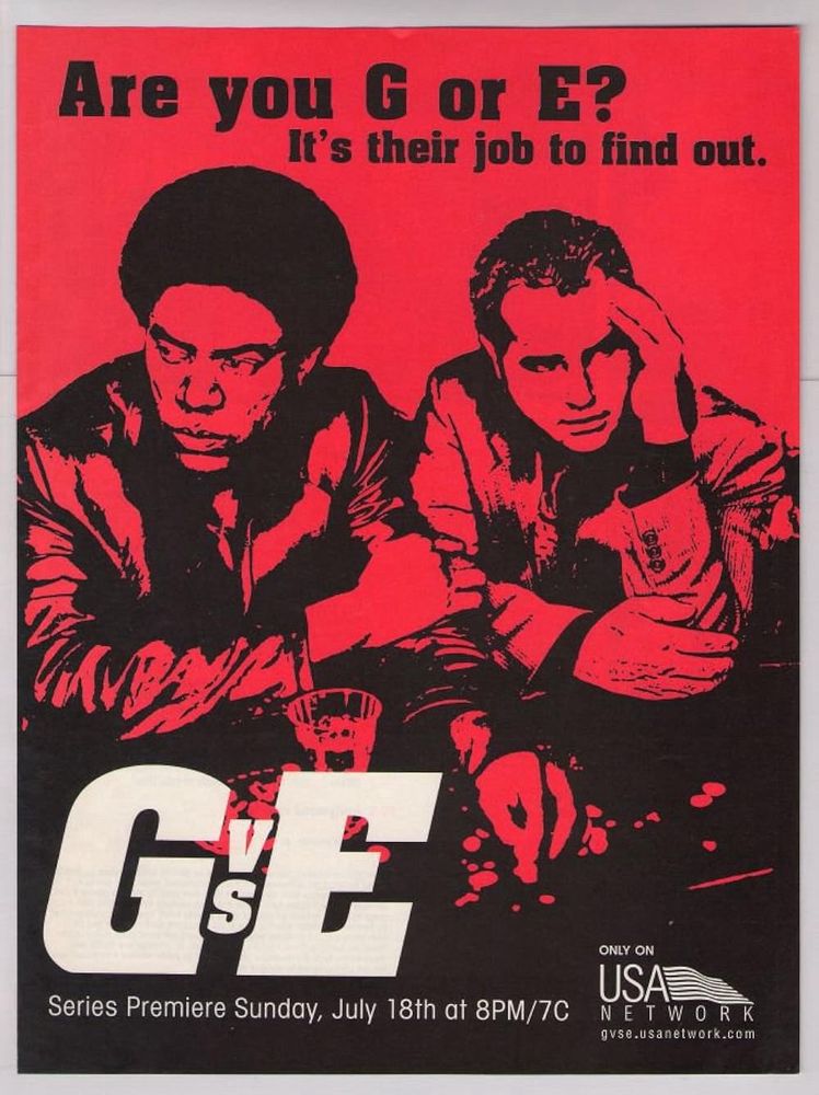 A poster in red, white, and black showed two men, with with an afro & another in a suit, with serious expression who are seated at a bar with the words “Are you G or E? It’s their job to find out.” across the top and “G vs E” and info on when it plays on the USA network across the bottom.