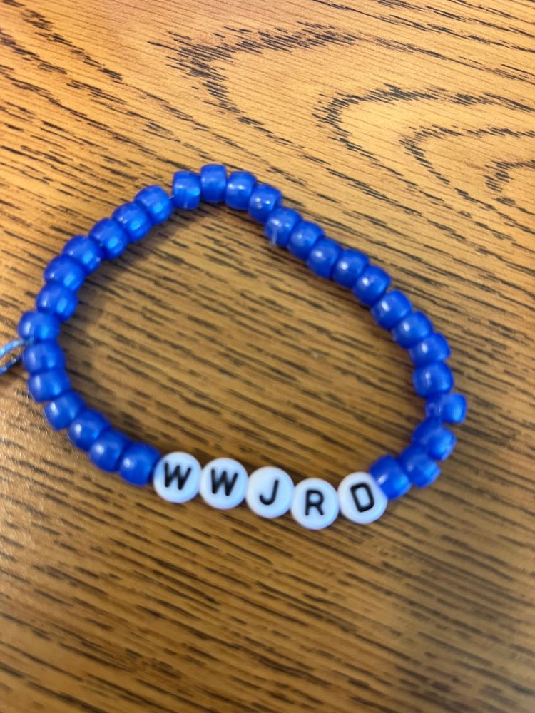 A bracelet with the letters WWJRD